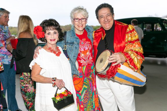 Carmon DeLeone dressed as a Cuban bongo player with wife and Artistic Director Victoria Morgan