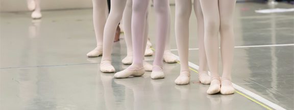 row of ballerina feet