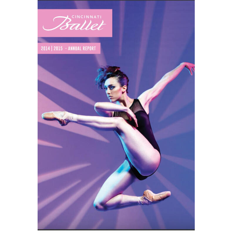A ballerina in a black leotard leaping in the air