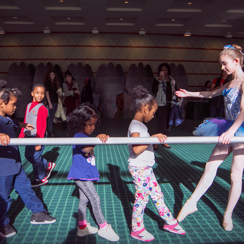 Ballet student demonstrates for children during Family Series at the Aronoff Center