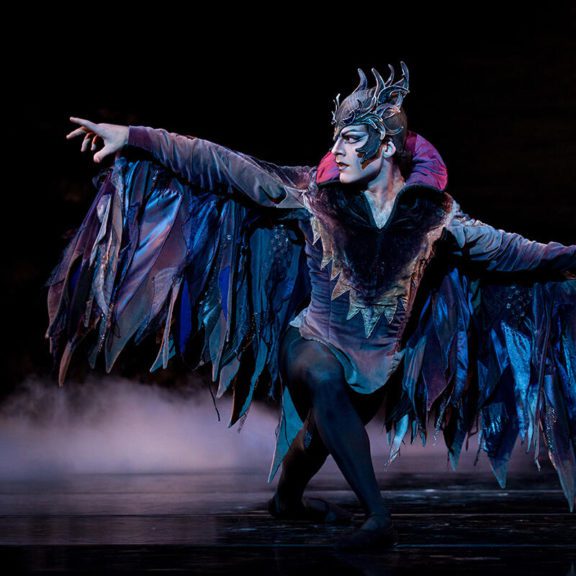 Ballerino dressed as Odile the black Swan