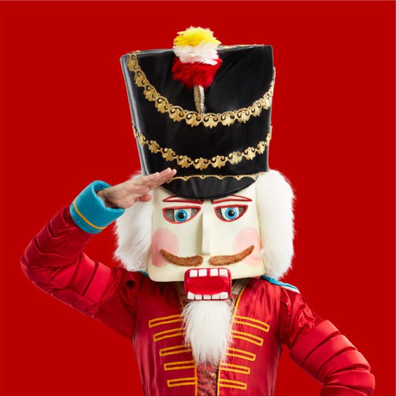 Photo of The Nutcracker character with a red background