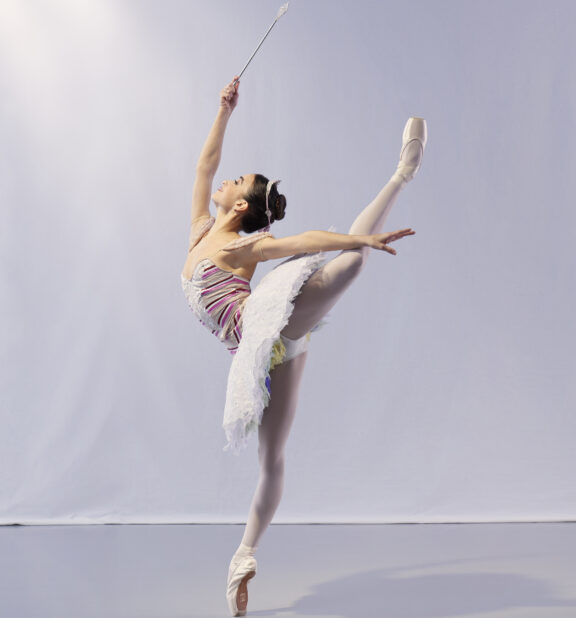 2023-2024 season | Photo of a female ballet dancer posing with a wand in her hand