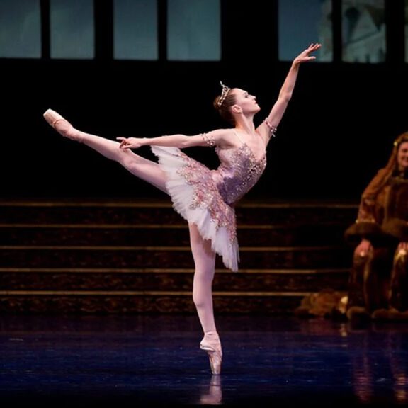 Photo of a ballerina dancing on stage